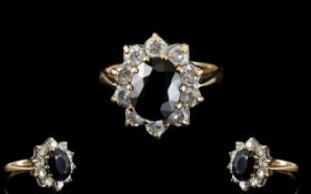 Ladies 9ct Gold Sapphire and CZ Set Cluster Ring, Flower head Setting. Full Hallmark for 9ct.