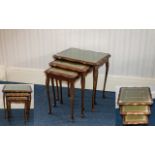 Nest Of Three Tables Of shaped rectangular form on cabriole legs with tooled leather tops.