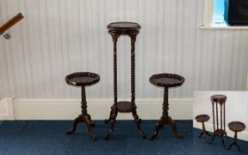 A Pair Of Modern Mahogany Finish Tripod Tables Each with moulded tops and barley twist supports.