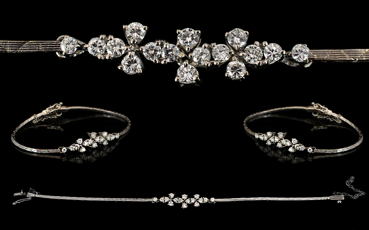 18ct White Gold Attractive Diamond Set Bracelet of Elegant Form.