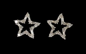 Diamond Pair of Star Shape Stud Earrings, an open star design, .5 inch (1.