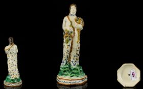 An 18th Century Staffordshire Pearlware Figure - Of One Of The Four Seasons.