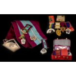 Masonic Interest A large Collection Of Regalia To inlcude various aprons, gloves, jewels,