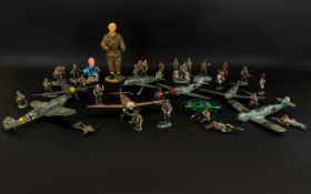 A Collection Of Cast Metal Toy Soldiers And Various Part-Built Plastic Model Aeroplanes All in play