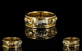 18ct Gold And Diamond Wedding Band The front with three Elephants encrusted with diamonds,