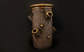 Antique Bretby Tree Trunk Umbrella Stand Unmarked in the form of a textured earthenware tree trunk,