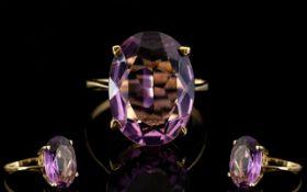 9ct Gold Single Stone Amethyst Set Dress Ring of Pleasing Form.