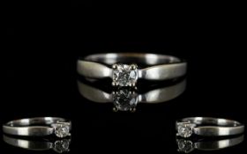 9ct Gold Diamond Single Stone Ring Set with a round modern brilliant cut diamond, fully hallmarked,