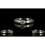 9ct Gold Diamond Single Stone Ring Set with a round modern brilliant cut diamond, fully hallmarked,