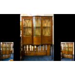 Edwardian Bow Fronted Display Cabinet, with astral glazed doors and inlaid decoration. Raised on
