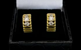 A Pair Of 18ct Gold And Diamond Set Earr