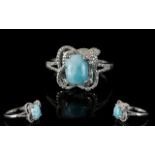 Larimar Solitaire Ring, a cushion cut la