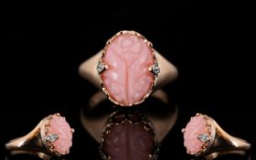 Pink Opal Hand Carved Ring, an oval cut pink opal of 4.