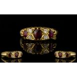 An Edwardian Period - Attractive 18ct Gold Ruby and Diamond Dress Ring of Superior Quality.