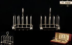 A Fine Pair of Presentation Boxed Sterling Silver Toast-racks of Small Proportions,