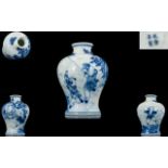 Chinese Blue And White Miniature Vase Of inverted baluster form,