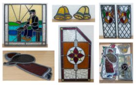 A Collection Of Christmas Related Leaded Stained Glass Pieces Comprising twenty pieces of various