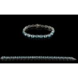 Sky Blue Topaz Tennis Bracelet, 42cts of oval cut sky blue topaz over nineteen stones,