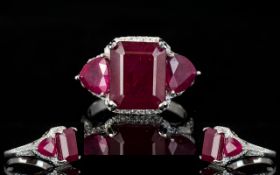Ruby Octagon and Trillion Cut Ring, the centre octagon cut ruby being 9cts,