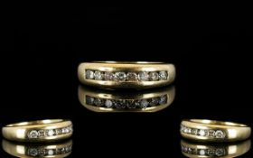 9ct Gold Diamond Eternity Ring Eight modern brilliant cut diamonds channel set, fully hallmarked,
