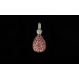 18ct White Gold Diamond Set Pendant Diamond set bale and ball above a pink gemstone pear shaped