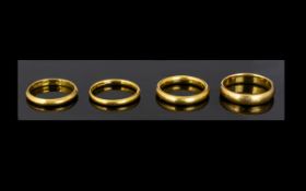 Collection of Early 20th Century 22ct Gold Wedding Bands, (4) four in total.