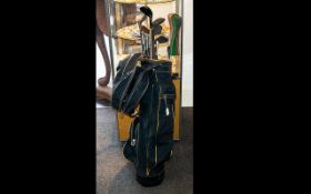 A Bag Of Vintage Golf Clubs To include various putters and clubs - all in vintage condition,