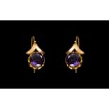 Antique 14ct Gold And Amethyst Earrings Wired drop earrings each set with a large faceted amethyst,