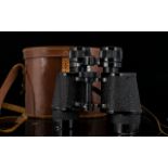 A Pair of Binoculars in Leather Case. Maker Denhill, made in France. Complete with leather neck