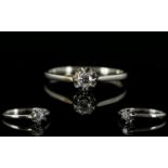 18ct White Gold Single Stone Diamond Set Dress Ring, Flower head Setting. The Single Stone Faceted