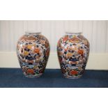 A Pair of Large Oriental Style Vases - each of ovoid form, decorated with traditional, floral,