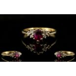 Ladies 9ct Gold - Attractive Ruby and Diamond Dress Ring.
