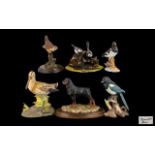 A Collection of Ceramic Animal Figures 6 in total of various heights and sizes,