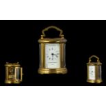 Matthew Norman Small Brass Carriage Clock of Pleasing Form with Glass Panels with Visible Open