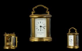 Matthew Norman Small Brass Carriage Clock of Pleasing Form with Glass Panels with Visible Open