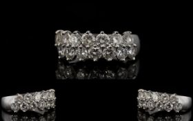 18ct White Gold Diamond Ring Set with two rows of round modern brilliant cut diamonds,