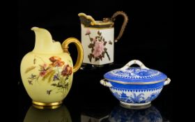 Royal Worcester Jug Hand painted floral design on blush ground with gilt moulded handle and poppy