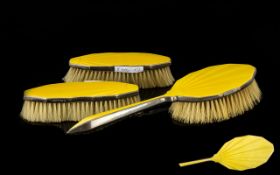 Three Silver And Guilloche Enamel Brushes Comprising hairbrush and two clothes brushes,