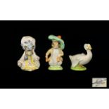 Beswick A Collection Of Beatrix Potter Figures Three in total to include 'Lady Mouse' height 4 1/2