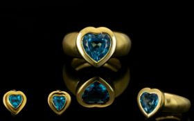 18ct Yellow Gold Attractive And Well Made Blue Topaz Set Dress Ring And Matching Earrings Each fully