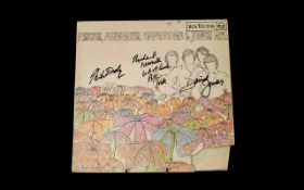 Autographs of The Monkees (4) on LP 'Pisces, Aquarius, Capricorn, Jones'.