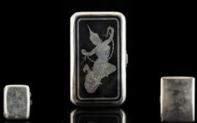 Indonesian Silver Cigarette Case with figural decoration depicting deity's - marked to clasp