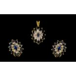 9ct Gold And Gemset Pendant And Earrings Suite Each of oval flowerhead design,