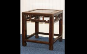 Chinese Antique Occasional Table of typical square form with reticulated apron and square legs.