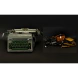 An Olympia Typewriter Together With A Quantity Of Super 8 And 35 mm Cameras 1960's typewriter,