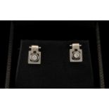 White Gold And Diamond Set Contemporary Earrings Stud earring of square form with brushed finish,