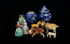 A Mixed Collection Of Ceramics A varied lot to include two blue and white oriental jars - each
