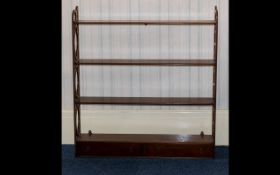 Mahogany Shelf Unit Rack - comprising three shelves above x 2 frieze drawers with open work sides.