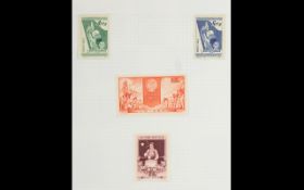 A Collection Of Three Stamp Albums two contain stamps from around the world,