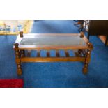 Mahogany Finish Coffee Table Rectangular form, glass topped with cross stretchers and slats,